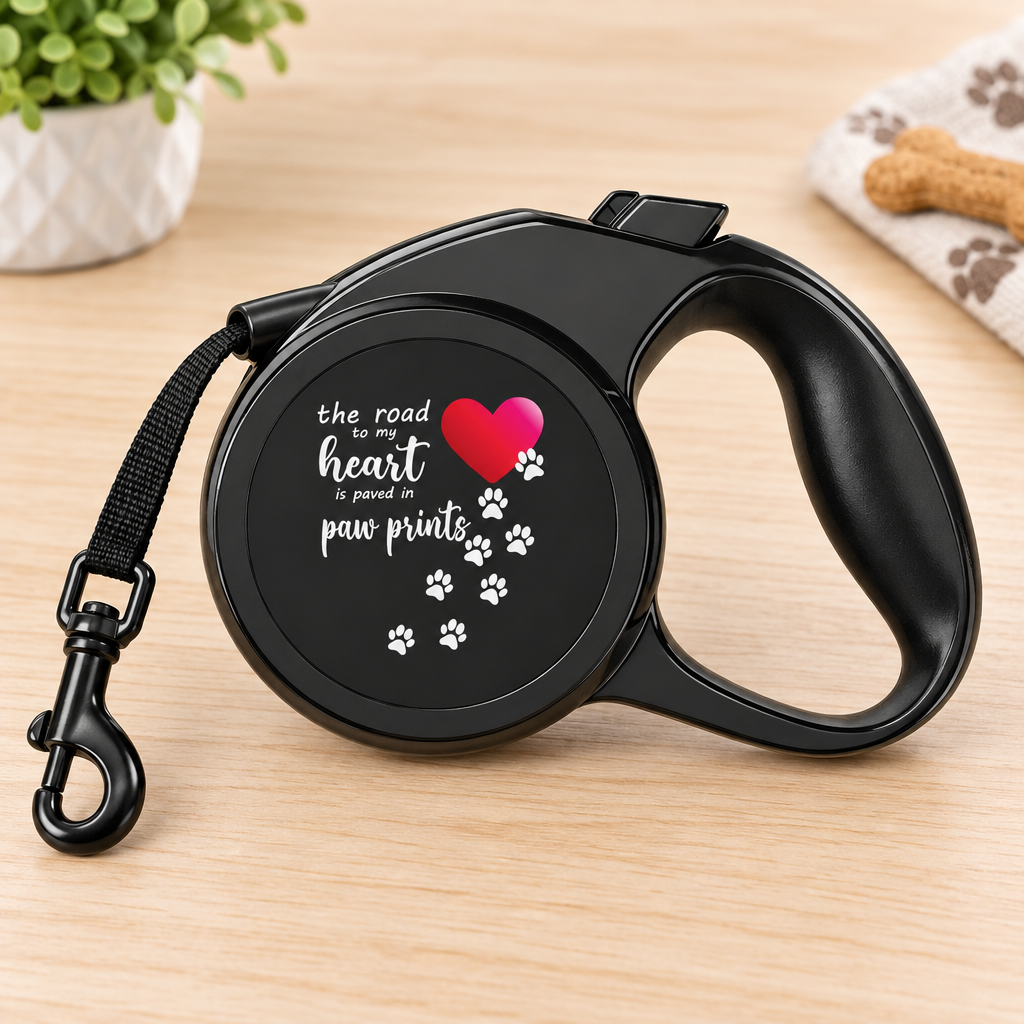 Close-up of the Road to My Heart retractable leash handle, lock button, and metal clip